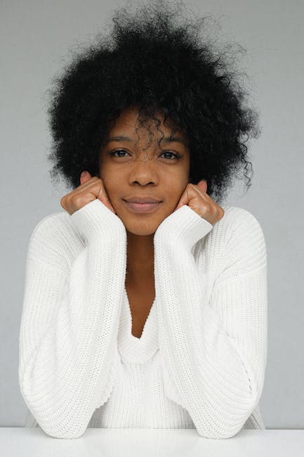 Woman in White Knit Sweater